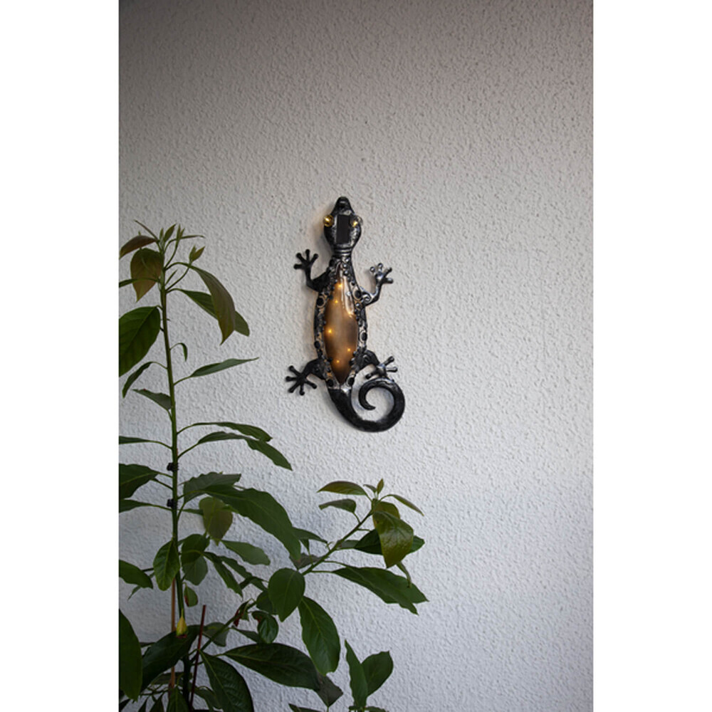 Schwarzer Wanddeko-Gecko aus dem Hause Star Trading, ausgestattet mit 20 LED Solarleuchten