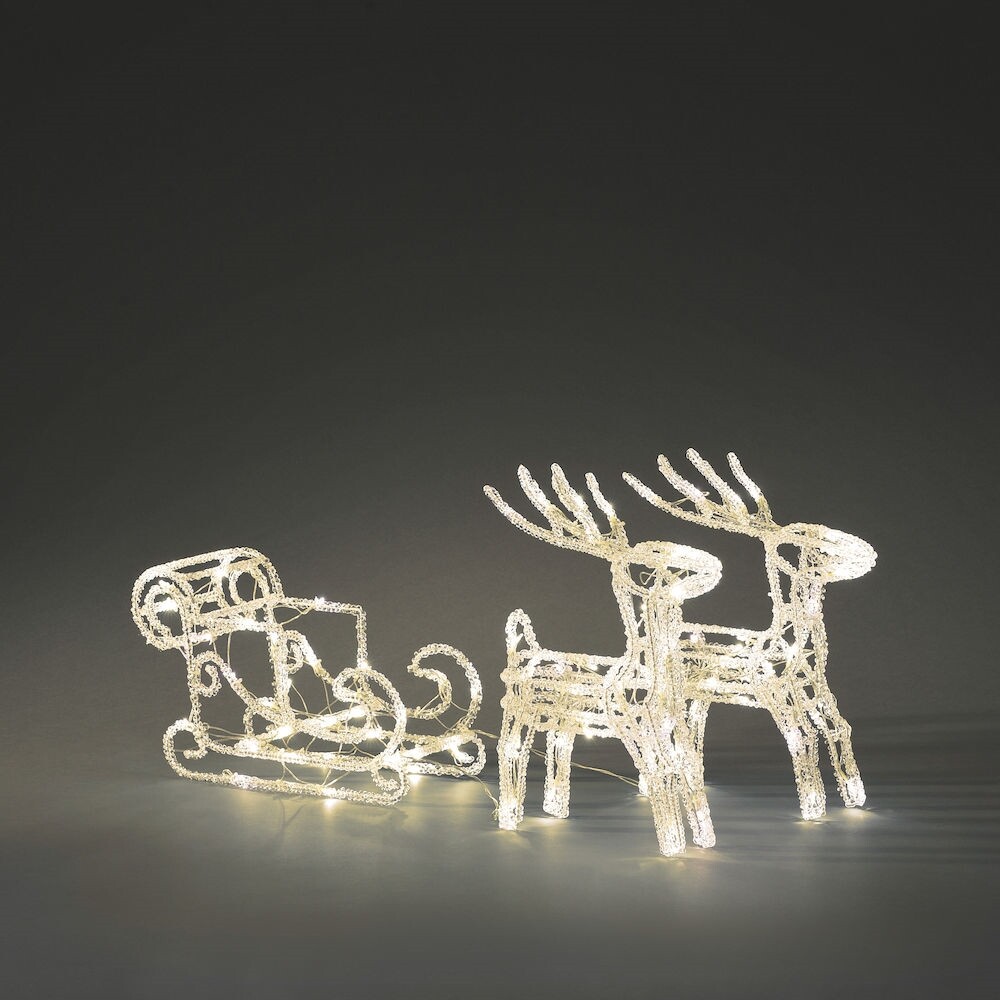 Festliche Leuchtfiguren Set von Konstsmide, bestehend aus einem Acryl Schlitten und zwei Rentieren, beleuchtet mit warm-weißen Dioden