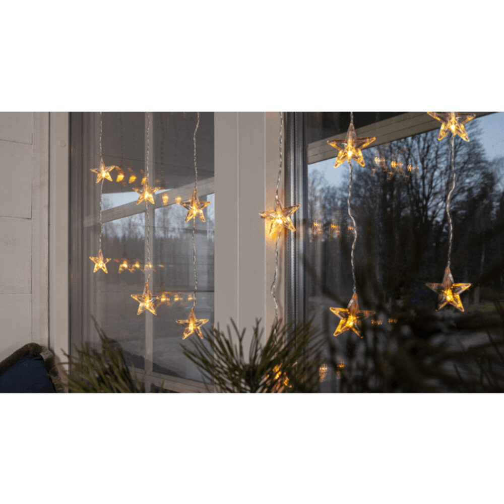 Betörender Lichtervorhang mit Sternen in warmweißen LED-Farben von Star Trading