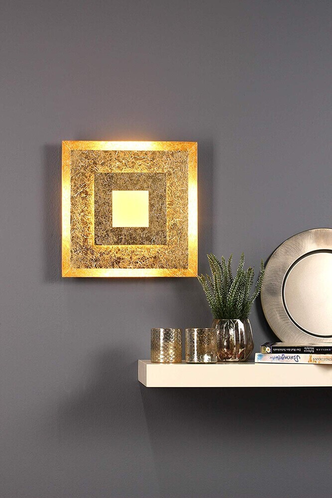 Beeindruckende goldene Wandleuchte WINDOW von ECO-LIGHT glänzt stilvoll an der Wand
