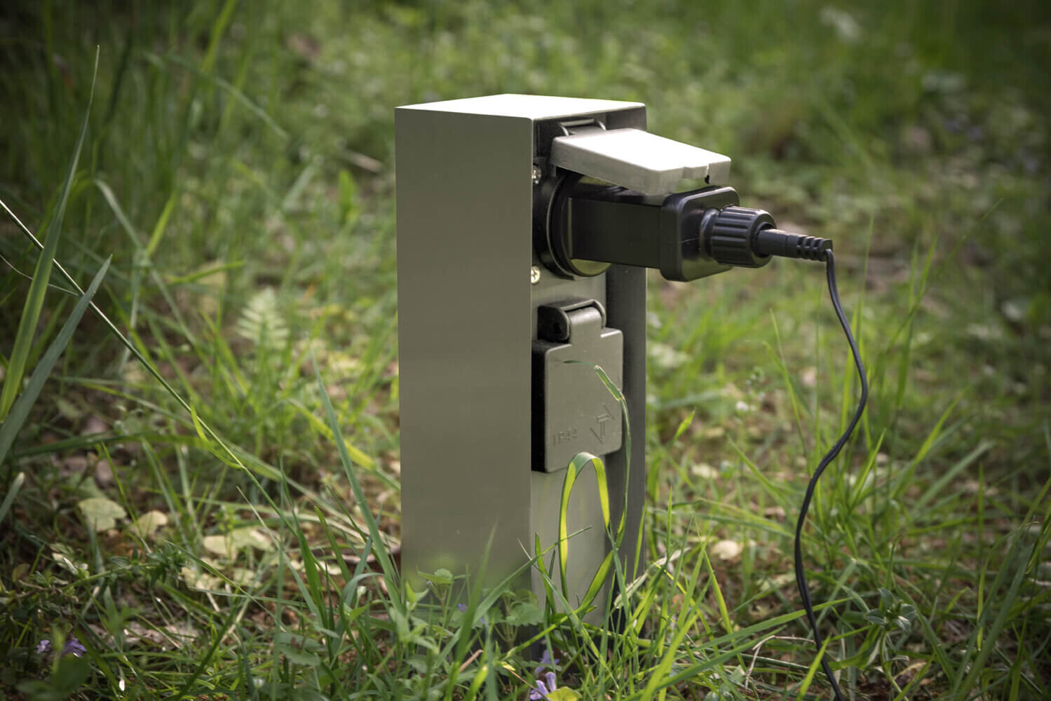 Silver outdoor plug socket offering two slots by LED Universum