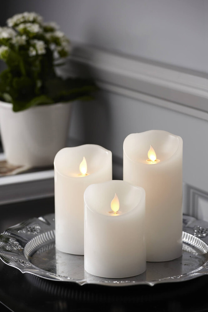 Attraktive LED Kerze in weiß mit beweglicher Flamme von Star Trading