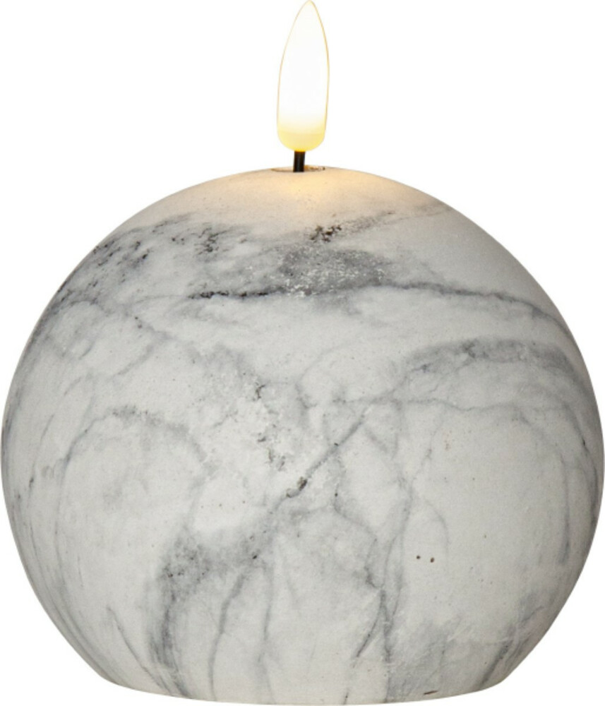 Ein runde LED Kerze von Star Trading in eleganter Marmoroptik mit beweglicher Flamme