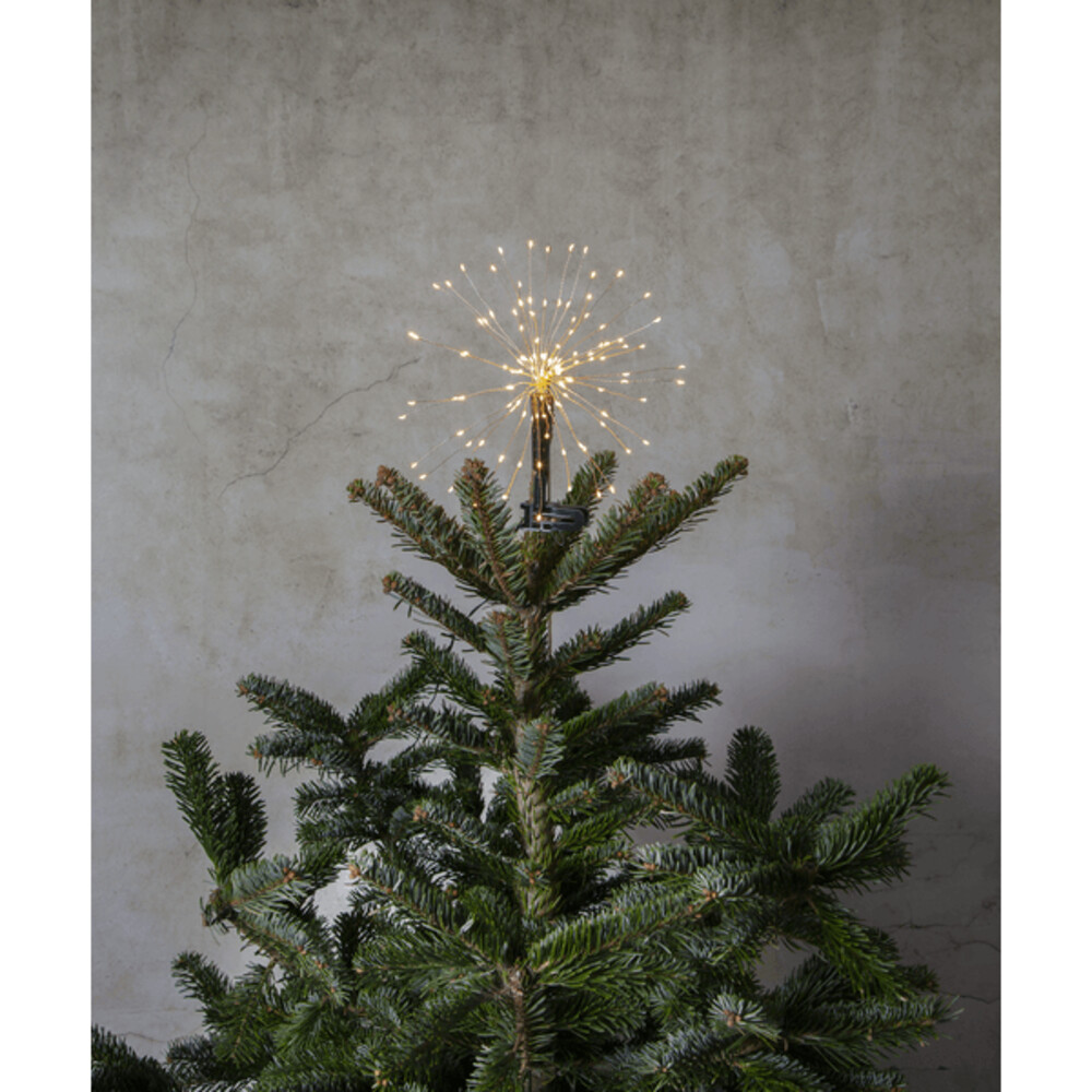 Detaillierte Aufnahme einer illuminierten Christbaumspitze von Star Trading, schwarz mit warmweißer Beleuchtung