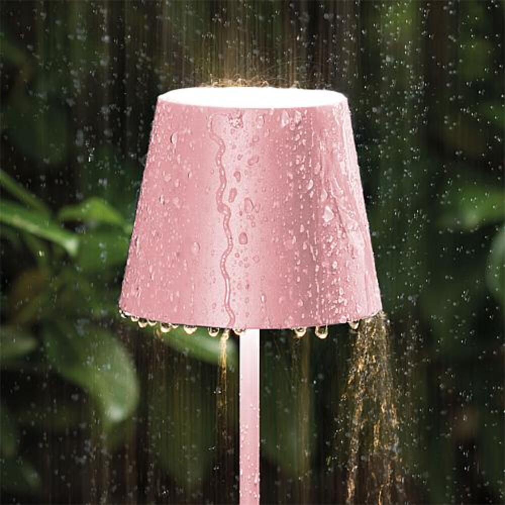 Attraktive rosa SIGOR LED Akku-Außenstehlampe, die ein gemütliches Licht verbreitet