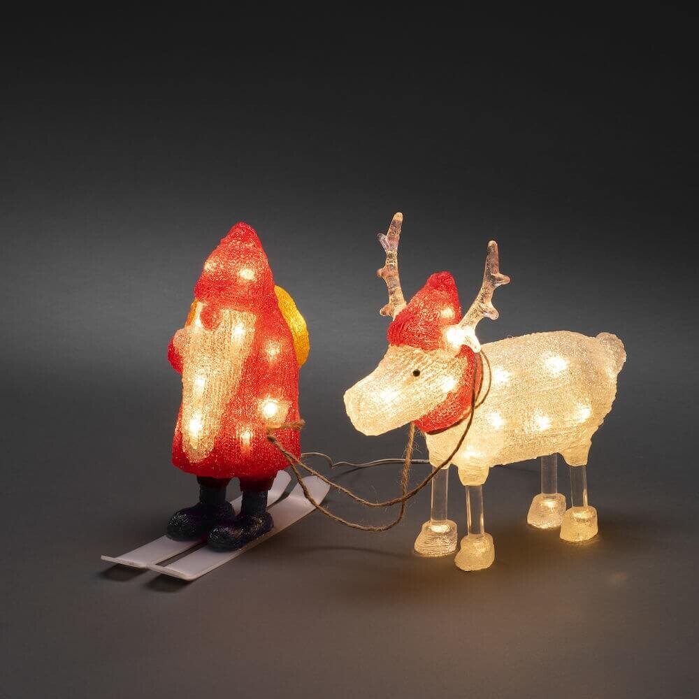Helle und warme Konstsmide Leuchtfigur Weihnachtswichtel mit Rentier