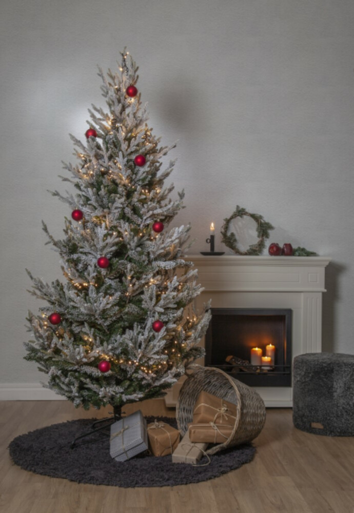 Prächtiger grüner Weihnachtsbaum mit Schneedekor und Metallfuß von Star Trading